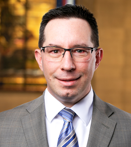 Headshot of George V. Baker, Jr of GRB Law